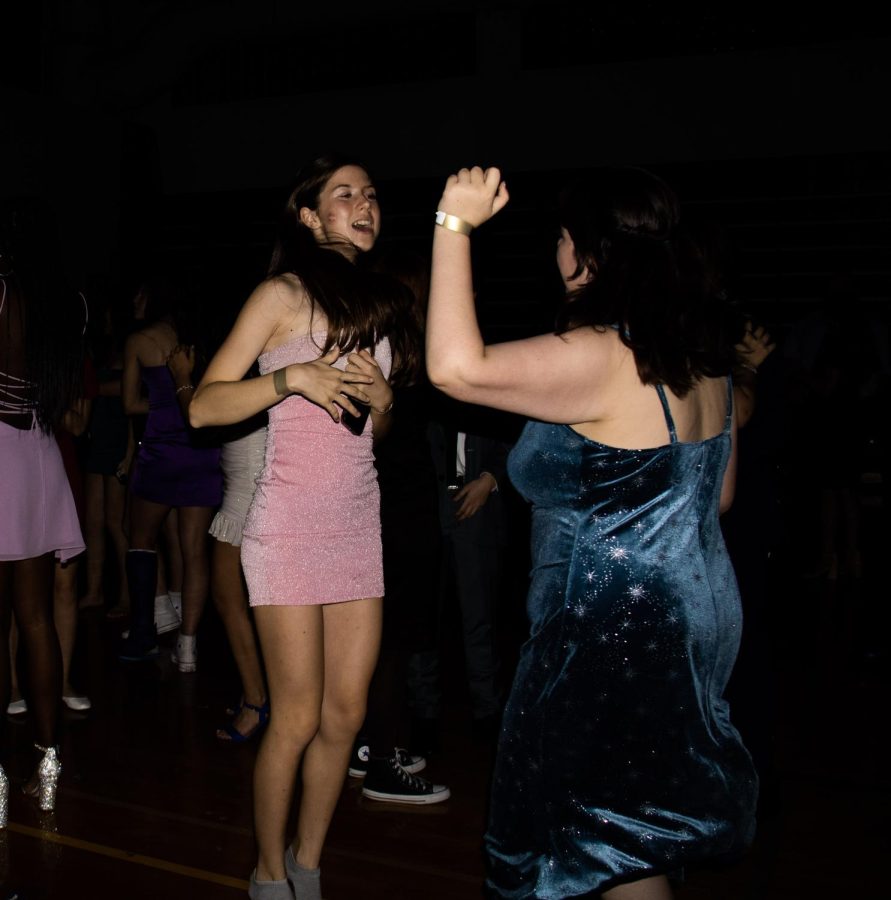 Communications+freshman+Chloe+Ryder+jumps+and+sings+along+to+the+music+during+the+Winter+Formal.+The+Winter+Formal+on+Jan.+21+was+the+first+one+in+Dreyfoos+history.%0A