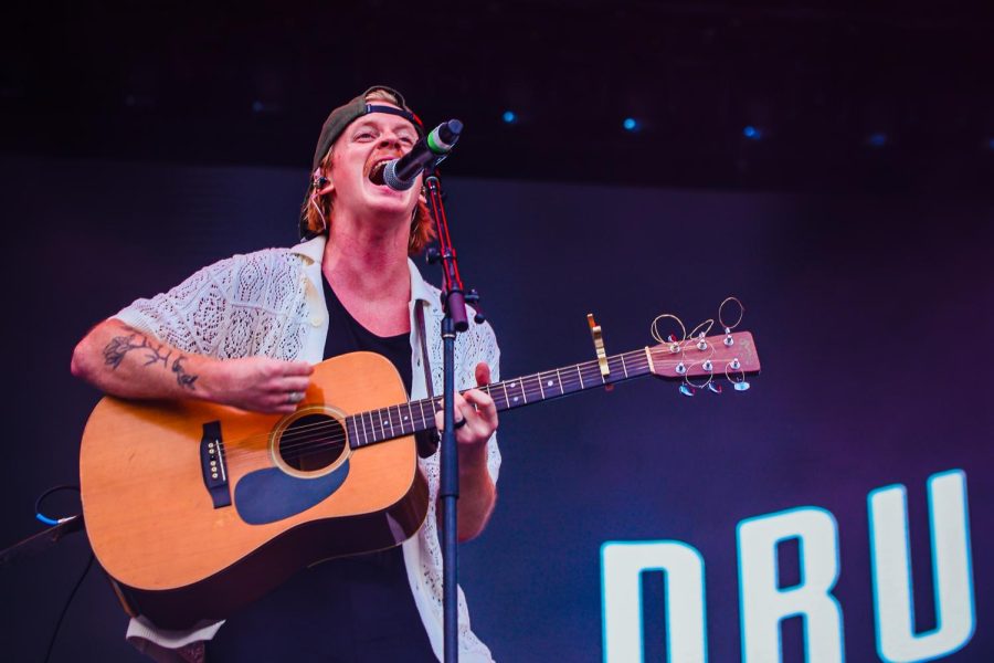 Micah Drum performs as the lead vocalist and guitarist for his band, Drum & Co., at the Ford Stage on Sunday, May 7. Based in West Palm Beach, Drum & Co. is a six person band that was able to use SunFest as an opportunity to gain more exposure as a small local artist.

