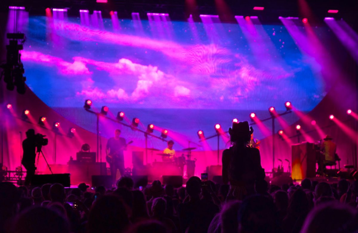 An audience member sits on another patron’s shoulders watching Jack Johnsen perform his song “Banana Pancakes” at the 2023 Sunfest Music Festival. Johnsen performed on May 6, the second day of the event. 