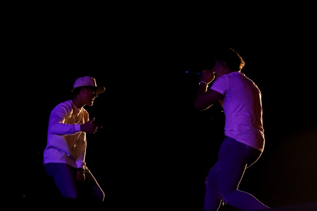 Mason and Julez Coutinho, 17- and 18- year old musical Australian brothers, perform an original song as the opening act prior to Luke Bryan’s performance.