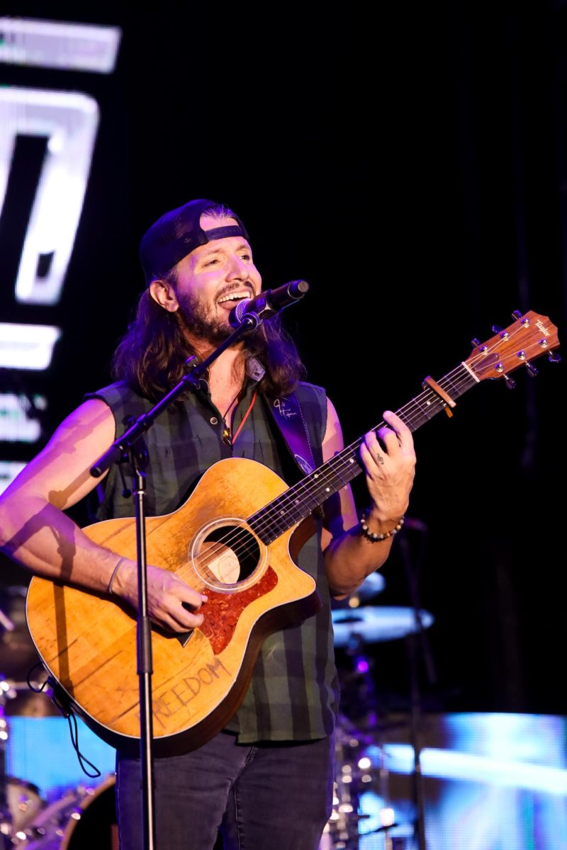 Local country artist Jutt Huffman, the unanimous winner of the Save Our Musicians Foundation event “Open for an Icon”, sings right before Luke Bryan. 