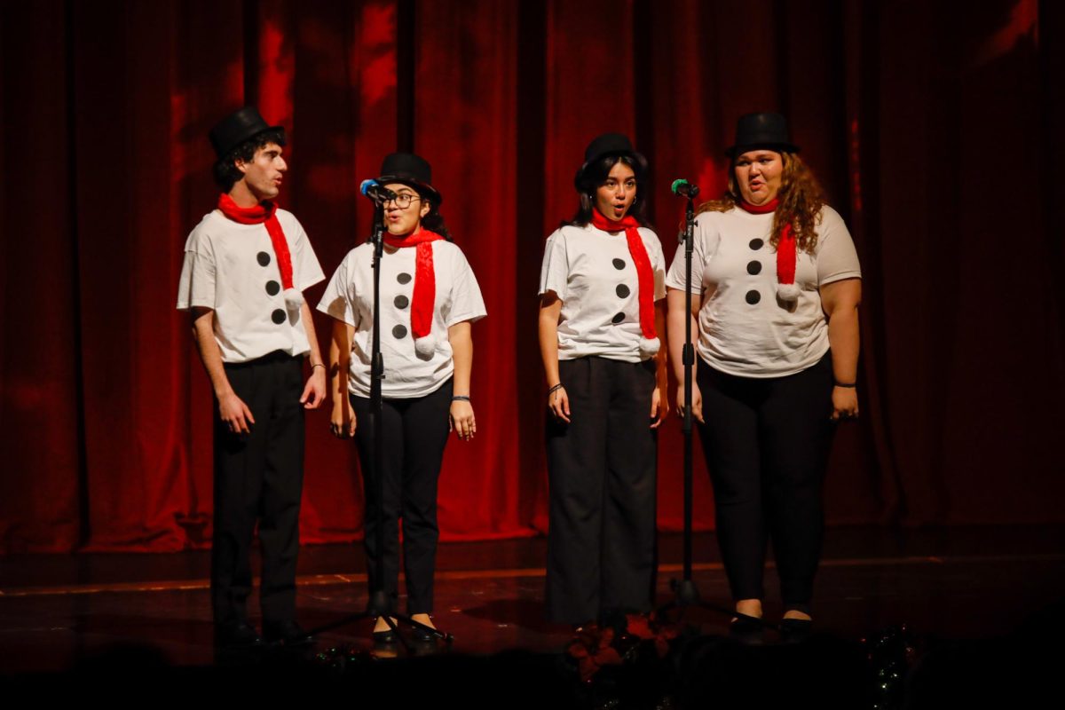Vocal seniors Brian Trompeter, Brianna Tejada, Angelina Castillo, and Aileen Pereda perform “Frosty the Snowman” at the 2023 Winter Arts Medley (WAM).