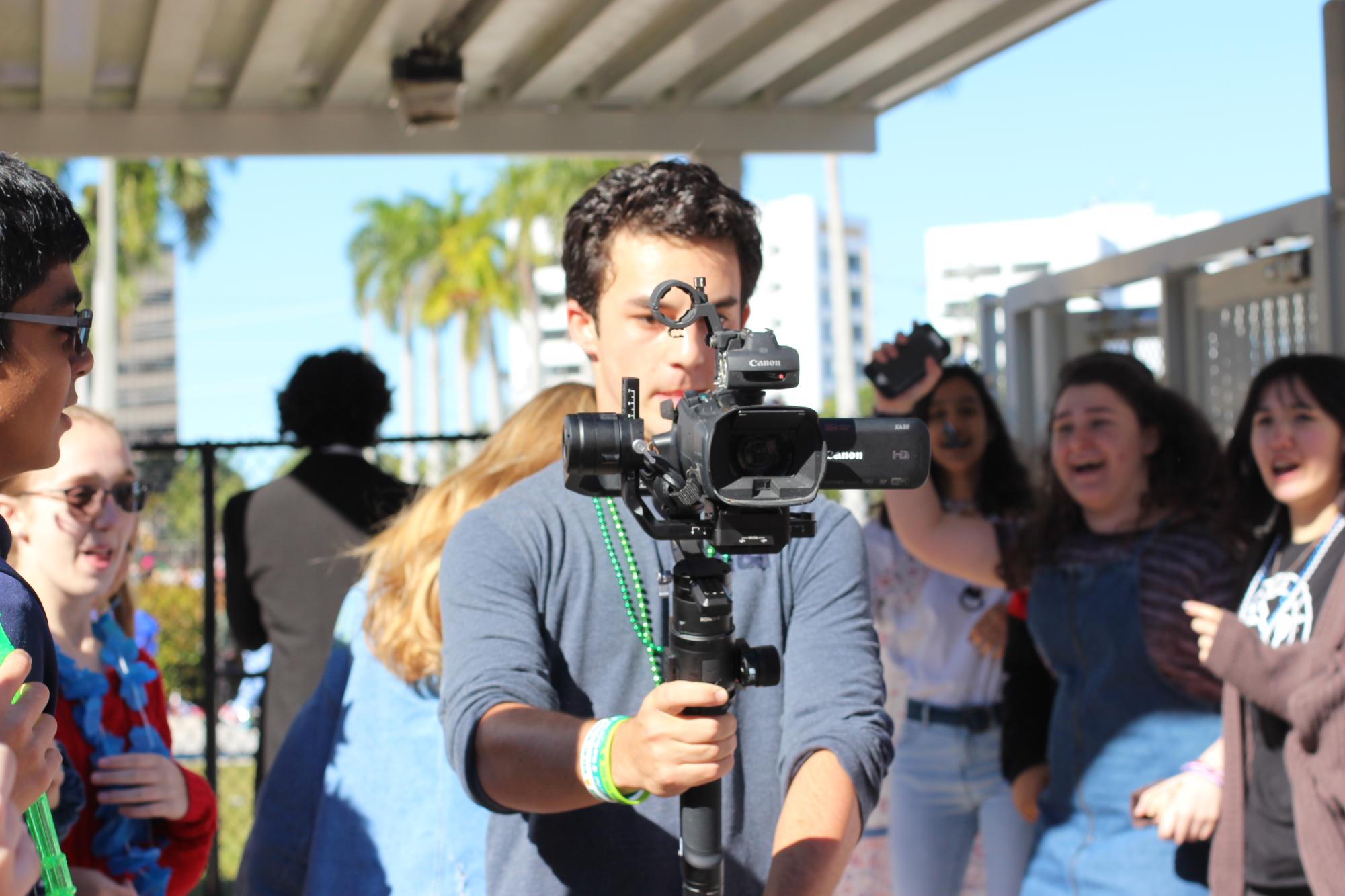 Alongside the growth of the Lip Dub, the parallel tradition of Seminole Ridge High School’s annual Lip Dub continued, which predates Dreyfoos’. The unofficial rivalry between the schools has reached audiences on Twitter and local radio, where listeners have been encouraged to vote for their favorite of the two.

“It was kind of exciting amongst ourselves to have a little sense of competition,” Goldstick said of the so-called feud. “You know, setting the bar high as you’re working to create it.”

More development on the Seminole Ridge rivalry will come in future versions of this article.
