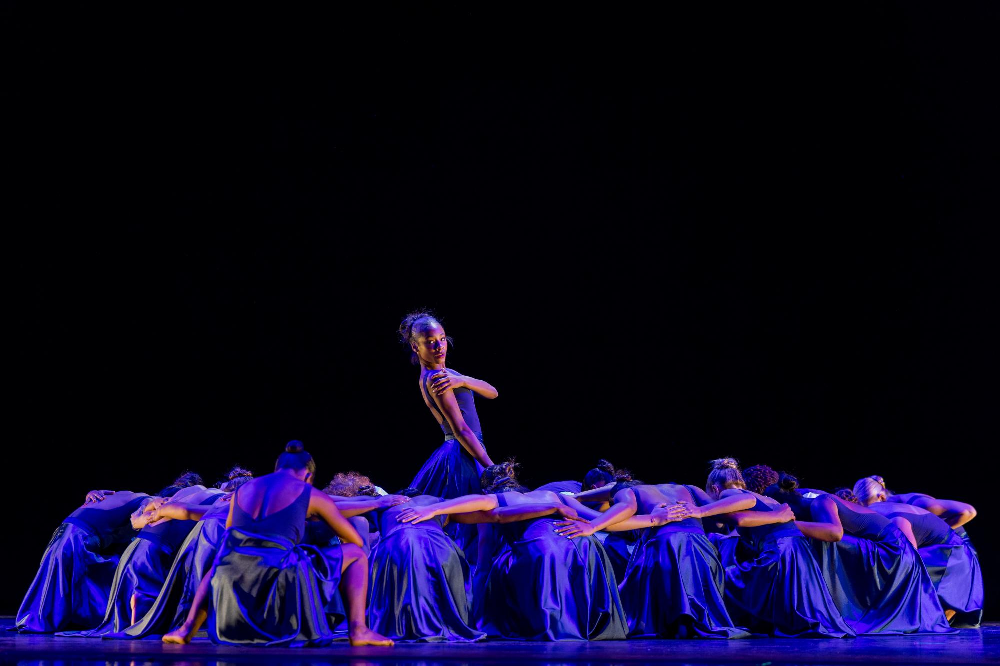 Dance junior Arielle Montopeirous poses during the finale of the in-school performance of “Be Our Guest.”
