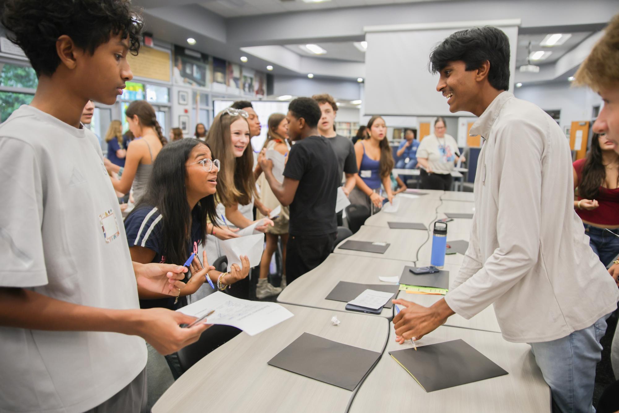 Participating in icebreakers, rising communications freshmen play a game of bingo as a way to get to know each other. Bingo questions varied from finding someone who has “starred in a short film” to "proficiently plays an instrument.” “You get to see what Dreyfoos is about and it's so far been really fun,” said communications freshman Arjun Kuturu. 
