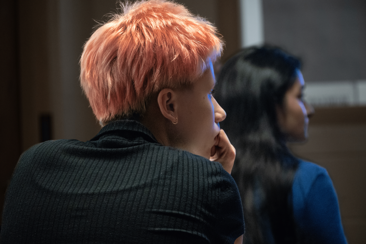 Outlining application requirements for the School of the Art Institute of Chicago, Admissions Manager Shanelle Harrison engages with digital arts and photography senior Magdalene Mika and other students. 