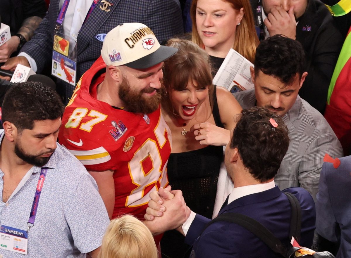 Football - NFL - Super Bowl LVIII - Kansas City Chiefs v San Francisco 49ers - Allegiant Stadium, Las Vegas, Nevada, United States - February 11, 2024 Kansas City Chiefs' Travis Kelce celebrates with partner Taylor Swift after Kansas City Chiefs win Super Bowl LVIII REUTERS/Mike Blake