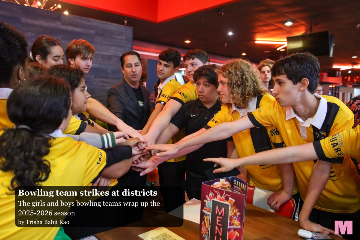 Putting their hands together, the boys and girls bowling teams discuss their plans for the Florida District 13 match. “This year’s team has a special bond,” bowling coach and science teacher Stephan Anand said. "We've built a really supportive atmosphere where everyone pushes each other to be better.” 