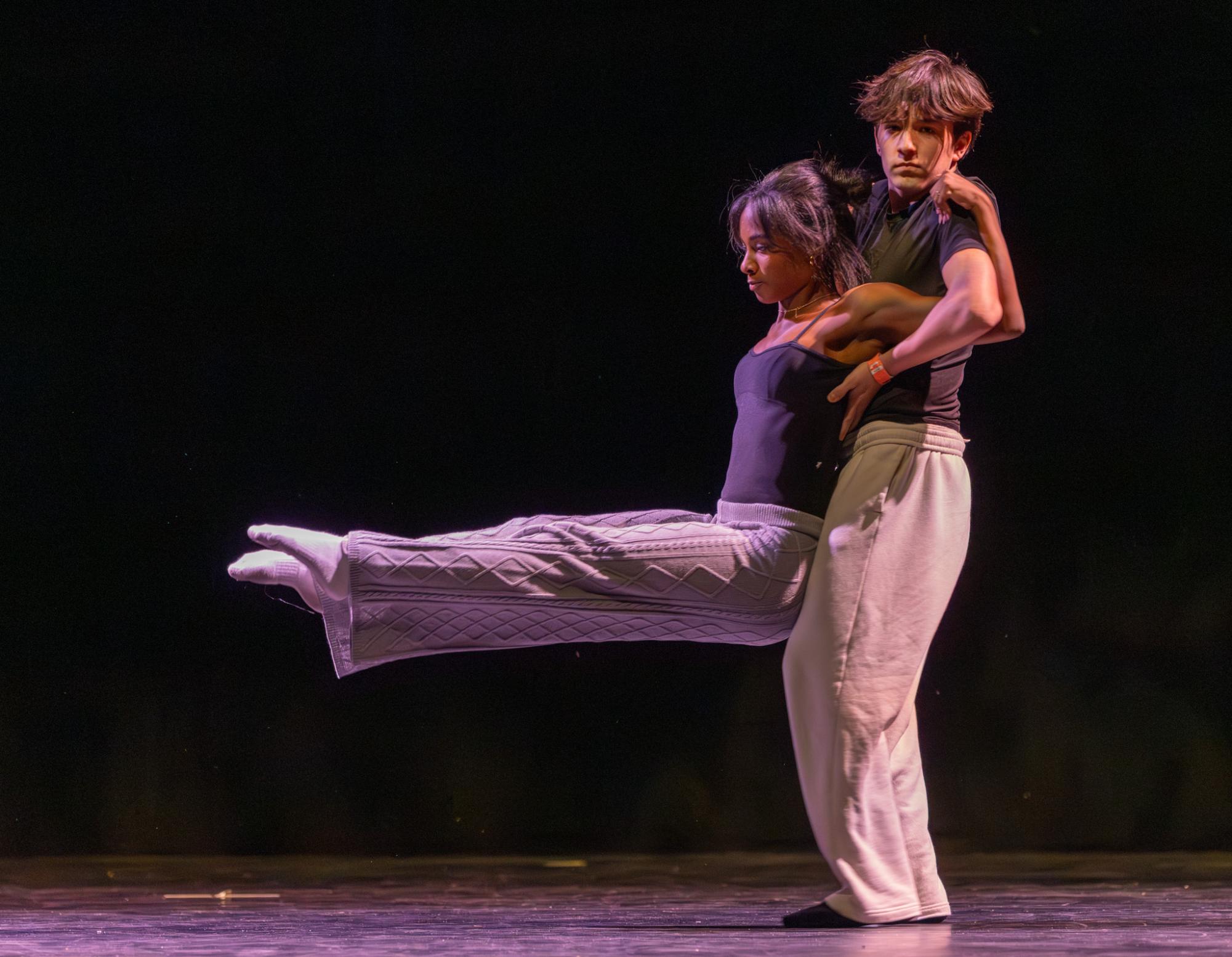 Performing a lift, dance sophomore Brandon Ross and dance senior Arielle Montpeirous are partnered together for a duet performance. “The most challenging part is putting it all together,” Montpeirous said. “With all the quick changes, it makes it difficult to navigate from piece to piece, but it eventually all comes together.”
