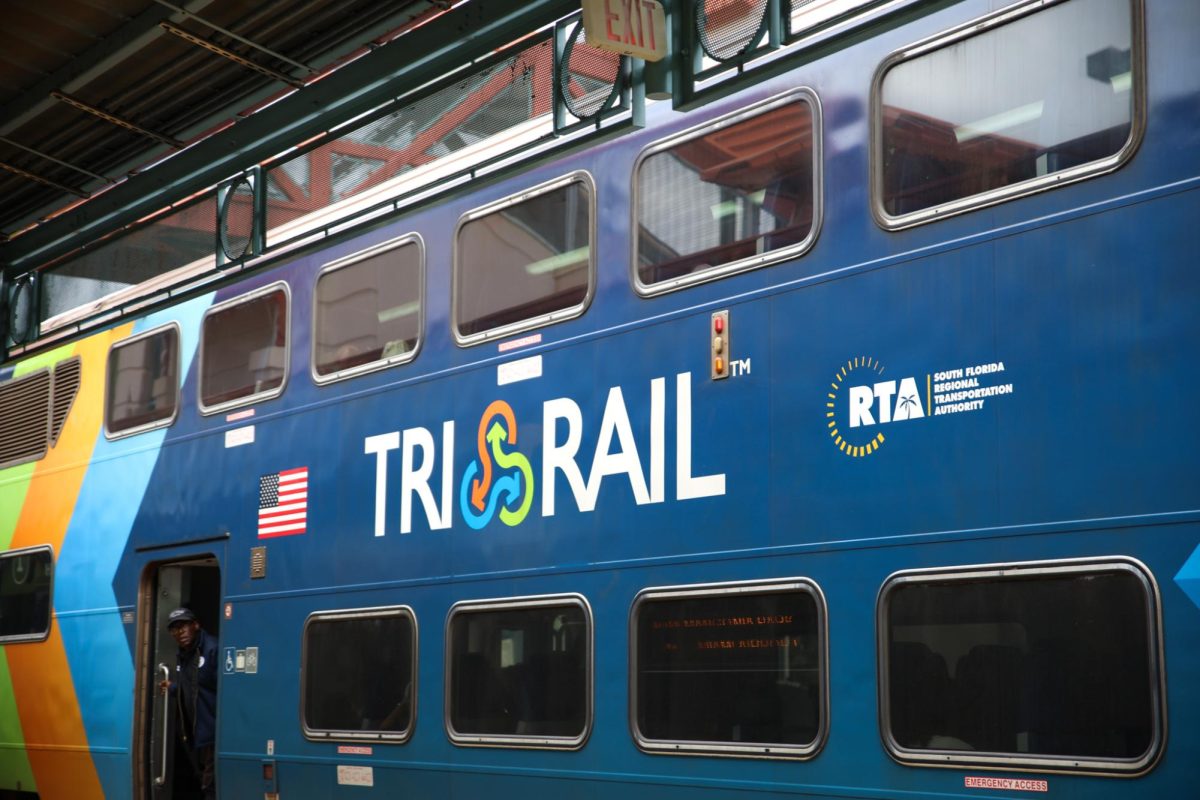 Coming into the West Palm Beach station, Tri-Rail train P633 opens its doors for awaiting students. 