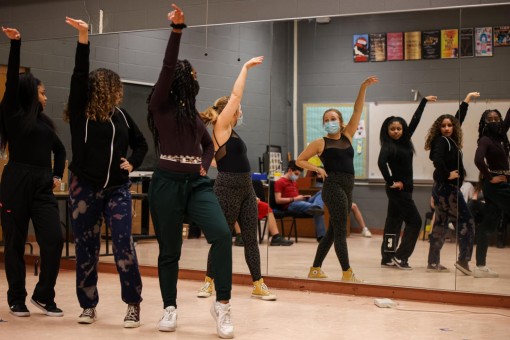 Theatre junior Avery Whitacre leads Jones, Marchena, and Bynum through the choreography to the opening number “Skid Row (Downtown)” before beginning their official run through. As choreographer, Whitacre was responsible for ensuring that every step was synchronized between the actors, breaking down particular numbers for them until it looked proper.