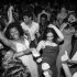 Theatre seniors Mahogany Prichard and Isabela Aronson dance amongst their friends at the annual prom. (Ashwin Kishor)