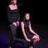 Sitting in a chair, theatre freshman Bella Catania crosses her legs as she and theatre freshman Ava Anger perform a duet piece titled, “I Wanna Go Back” from “The Notebook” by Ingrid Michaelson.