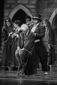 Sorting the students of Hogwarts into their houses, theatre senior Dior Knight (the Sorting Hat) gestures his hands above theatre senior Darien Batista’s head (Scorpius Malfoy) to place him into the Slytherin house. “Scorpius Malfoy, unlike his father, who was the bully, the bratty, rich kid, is actually very humble, timid, nerdy, and geeky,” Batista said. “He only really has one friend, who's Albus, and that's Harry Potter's son. To get into the character, it's more of a complete physical transformation but also mentally stepping into that character.”