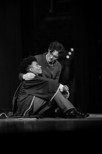 Leaning on one another, theatre seniors Kevontay Oliver (Albus Potter) and Connor Hullender (Harry Potter) look at each other in the final scene of “Harry Potter and the Cursed Child.” “It's amazing to work with him (Oliver), absolutely amazing,” theatre senior Darien Batista, who plays the role of Scorpius Malfoy, said. “He has very wonderful character work and encompasses the role of Albus Potter so naturally. He truly is talented.”