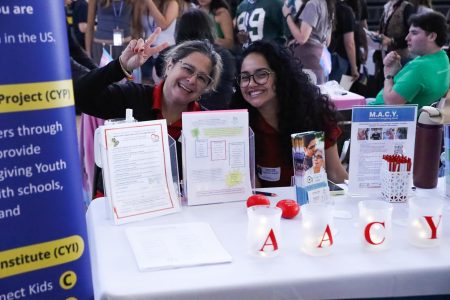 Representatives of the MENTOR A CAREGIVING YOUTH pose for a photo while at the
annual mental health expo.