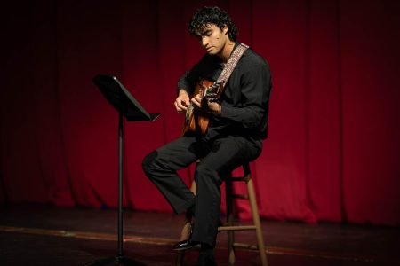 Performing a rendition of “La Mentira” by Álvaro Carrillo, vocal senior Alex Matos sings and plays the guitar for the Latin Hispanic Heritage Club (LHHC) portion of the Multicultural Show.