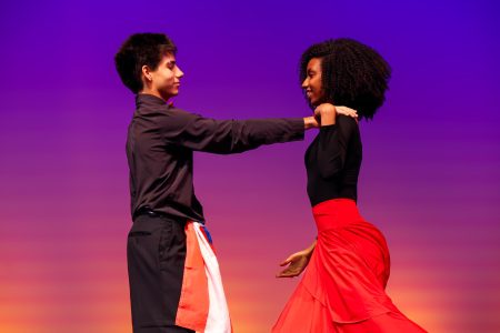 Performing a salsa routine together, dance junior Patrick Richardson and theatre junior Sade Leandre dance as part of the Caribbean Heritage Club’s (CHC) segment of the Multicultural Show.