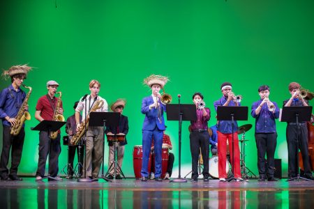 The jazz band performs “Suavemente,” a Puerto Rican merengue song, during the Latin and Hispanic Heritage Club’s (LHHC) portion of the multicultural show.
