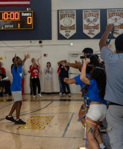 Hands in the air, visual freshman Roodnel Blaise celebrates after winning first place in “Queen’s Request.” This win marked the first time the freshmen class won first place in this year’s Spirit Week.
