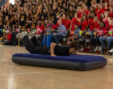 Sliding onto the mattress, strings senior Nicolas Aquel-Lacayo wins the “Mattress Sliding” game for the seniors. The seniors faced off against the juniors in the final round, marking their first win of the event.
