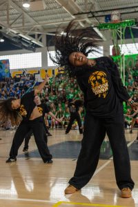 Flipping her hair, digital arts and photography student Zyan Robinson dances in the senior Pep Rally dance. Having the theme of “Stranger Things,” the senior dance included skits of characters from the show as well as choreography to themed songs.