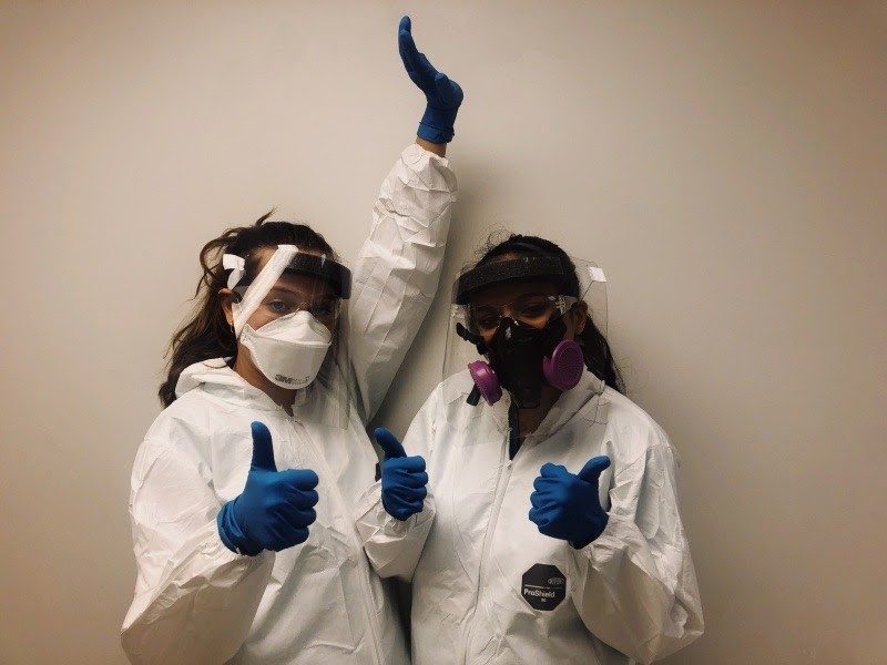 Watson, left, and Inayat Sood, right, geared up and ready to go to work. At the Medical Examiner Office of Palm Beach County, Watson worked closely with those involved in the field of forensic pathology as a summer job, shadowing medical examiners in autopsies and accompanying investigators to crime scenes. “I am so grateful for the opportunity that [Dr. Wendolyn Sneed has] given me,” Watson says, reflecting on her unique job during the summer. Photo courtesy of Alex Watson’s VSCO.